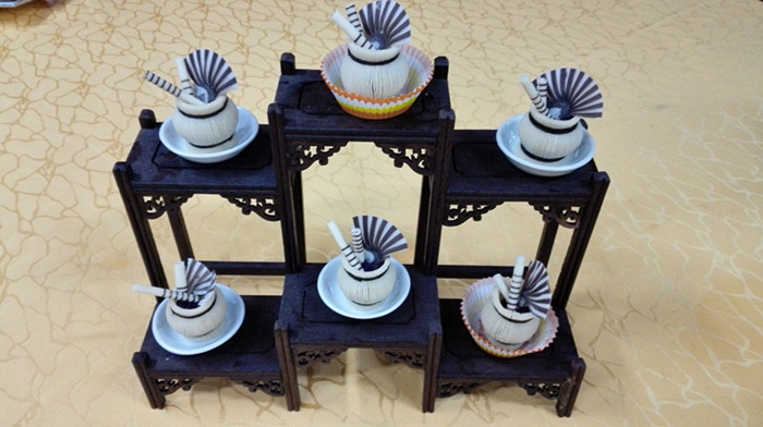 1522387142242484.jpg 省赛面点第一名 杨丽红 作品《花坛酥》.jpg